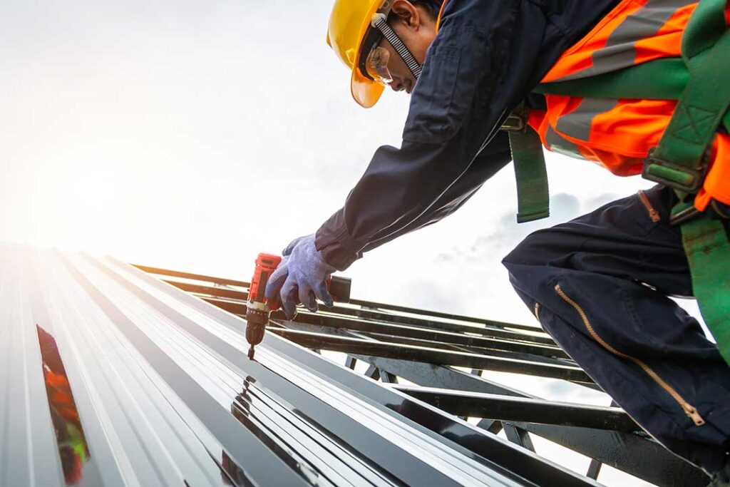 Homeowner examining roof shingles and attic rafters with a flashlight and inspection checklist KEYWORDS: ["roof inspection", "homeowner attic inspection", "roof shingles and gutters"]